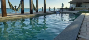 Apartamento 102 Beira Mar em Maceió Waterfront com 2 suítes e mobiliado na praia de Ipioca, Maceió